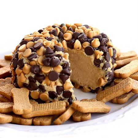 This will be made at least 3 times during this holiday season. Peanut Butter "Cheese Ball". 1 package (8 ounces) cream cheese, at room temperature 1 cup powdered sugar 3/4 cup creamy peanut butter (not all-natural) 3 tablespoons packed brown sugar 3/4 cup milk chocolate chips 3/4 cup peanut butter chips Graham cracker sticks, teddy grahams, and/or apple slices for dipping