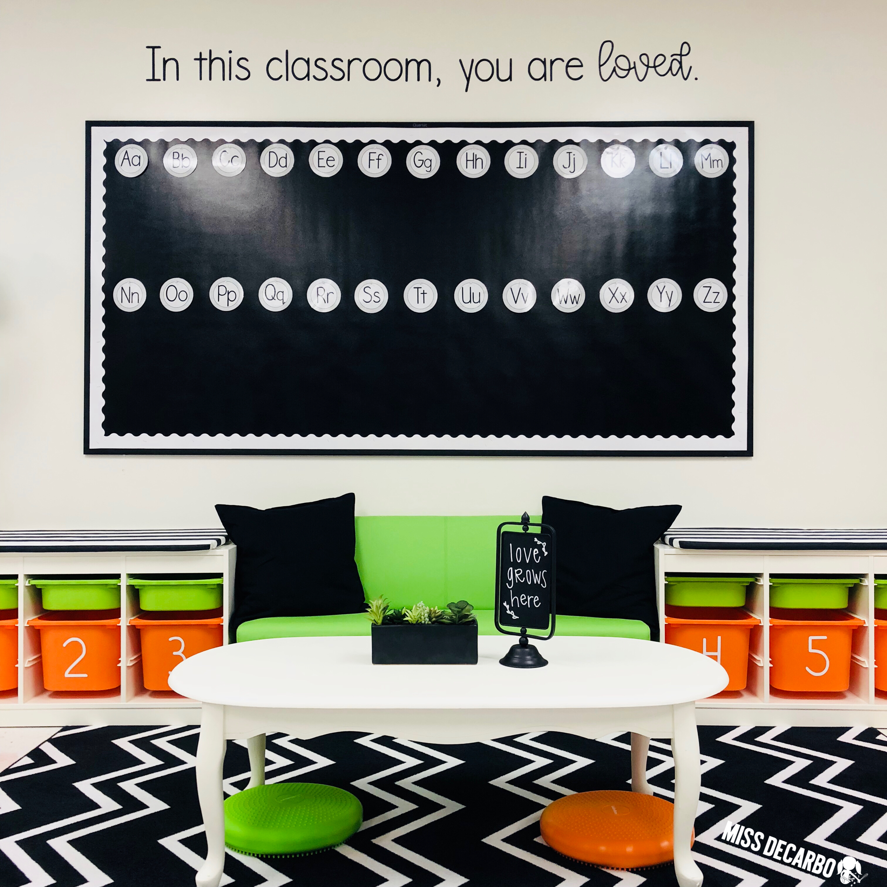 A bright and colorful living room area for flexible seating in a first-grade classroom. 