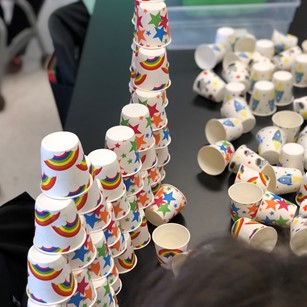 Small paper cups make an excellent STEM activity for morning tubs and indoor recess.
