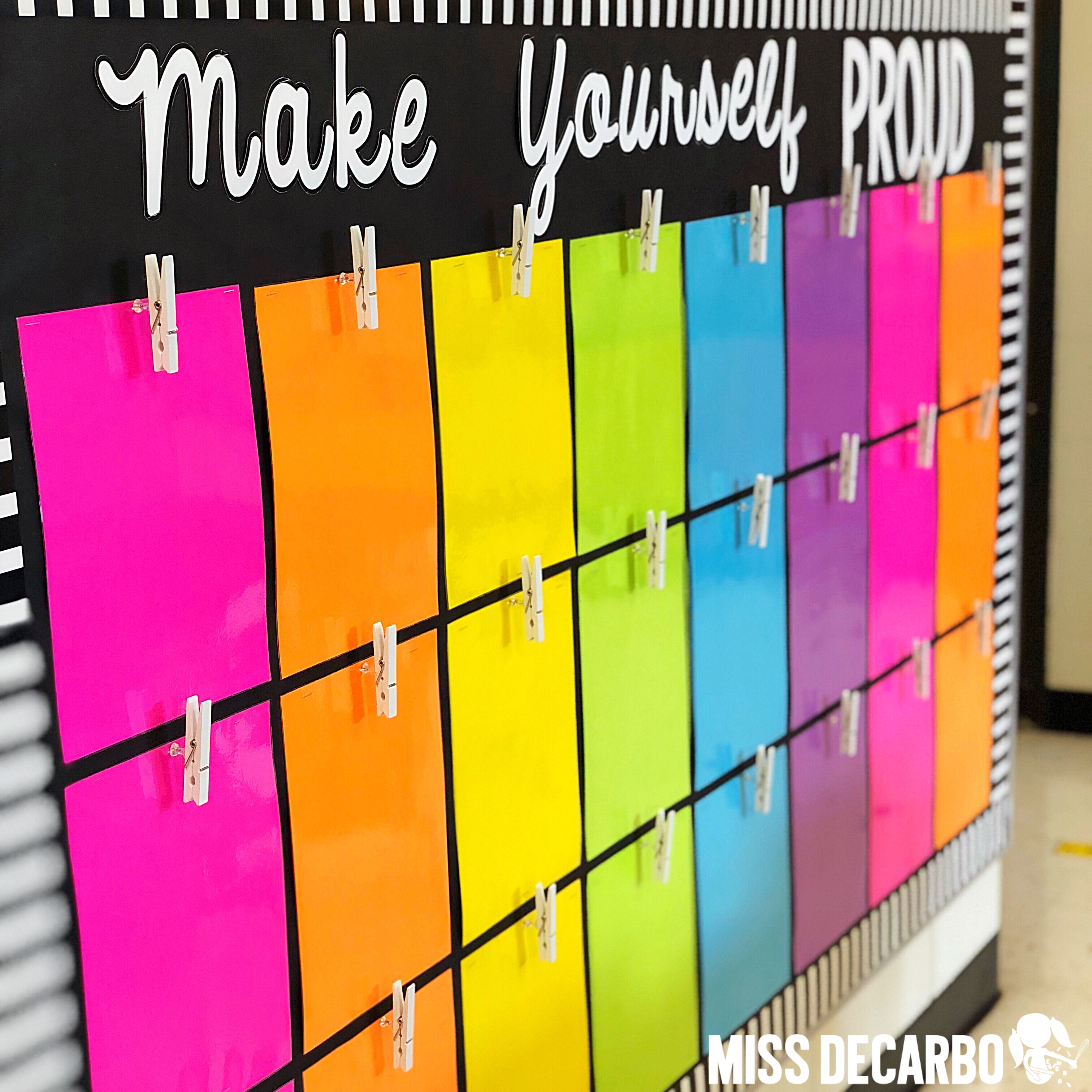 Brightly colored cardstock was used to make this student display bulletin board! Laminate the cardstock for durability and staple it onto the board. 