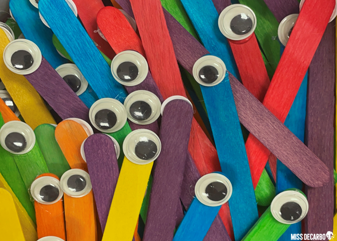 Popsicle stick eyeball pointers make a great reading tool and activity for literacy night.