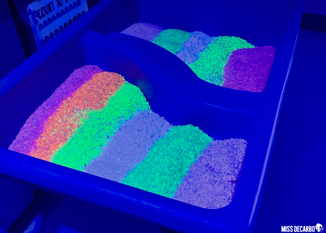 Use glow-in-the-dark rice for an activity for literacy night using sensory tables and letter formations! 